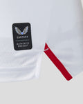 Close-up of white Feyenoord sleeve with Castore Authentic Product patch and red trim.