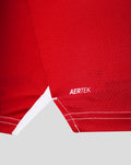 Close-up of red Feyenoord Pro Thuisshirt fabric with AERTEK branding near the hem