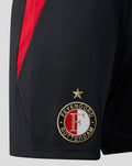 Close up of Feyenoord Thuisshort 2026-2027 in black with a red side panel and embroidered crest with star