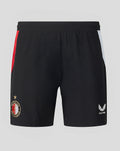 Back view of black Feyenoord home shorts with red side stripe and white panel, displaying the club crest and Castore logo.