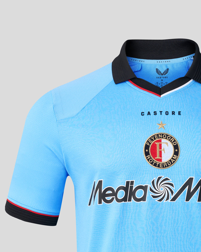 Close up of Feyenoord blue Pro Uitshirt collar area with black neck trim and club crest on chest