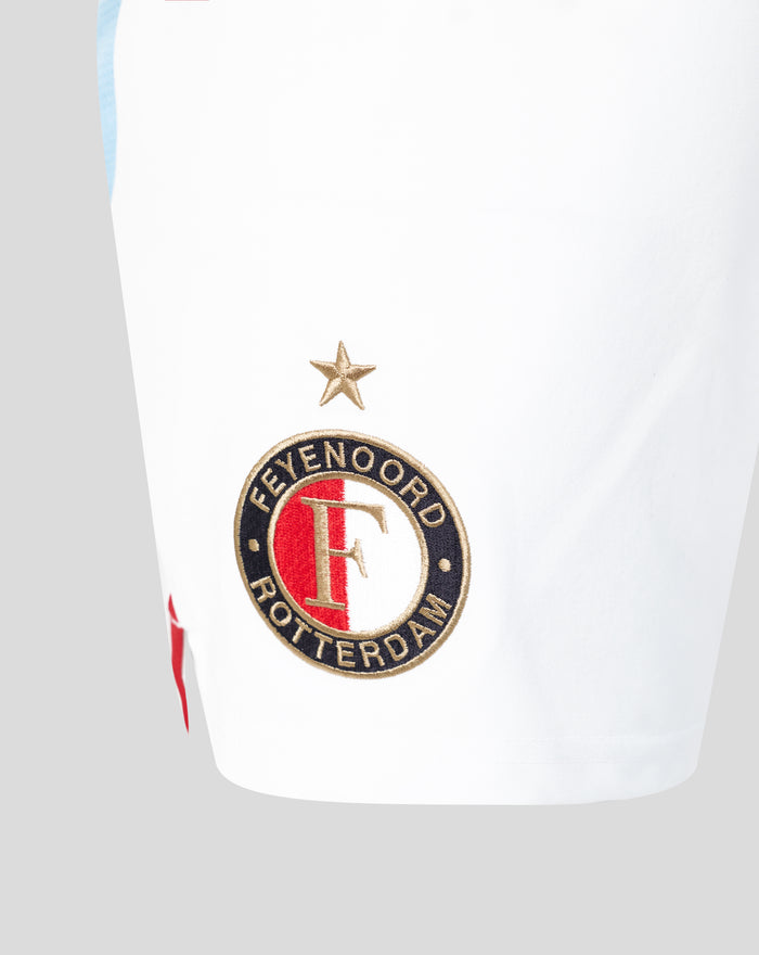 Close up of the Feyenoord Rotterdam emblem embroidered on white shorts with a gold star above