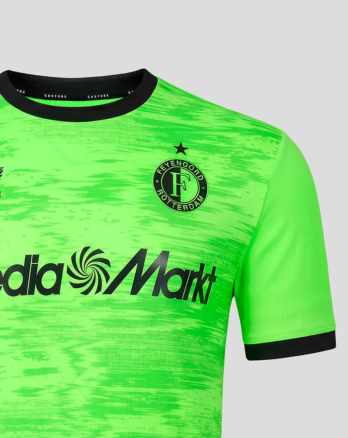 Bright neon green Feyenoord keeper shirt with crest left chest, Castore logo right, and MediaMarkt sponsor.