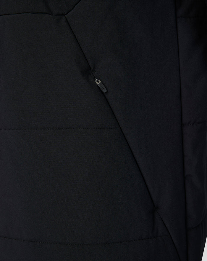 Close-up of black Feyenoord training jacket fabric with an angled zip pocket detail