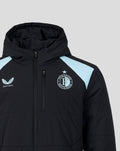 Close up of black Feyenoord coach jacket showing the crest on the chest the Castore logo and light blue shoulder panels