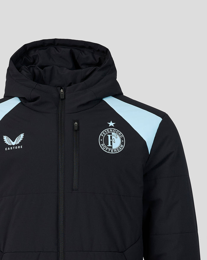 Close up of black Feyenoord coach jacket showing the crest on the chest the Castore logo and light blue shoulder panels