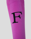 Bright pink Feyenoord third keeper sock for adults with a bold black F on the shin