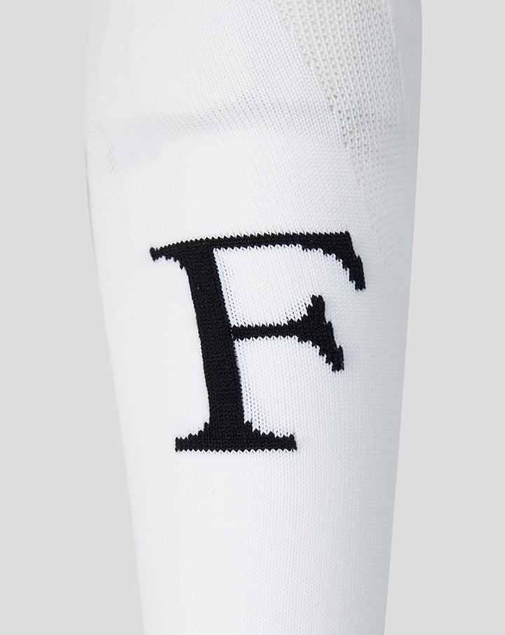 Close-up of a white Feyenoord Thuis Wissel sock for adults showing a bold black F on the leg