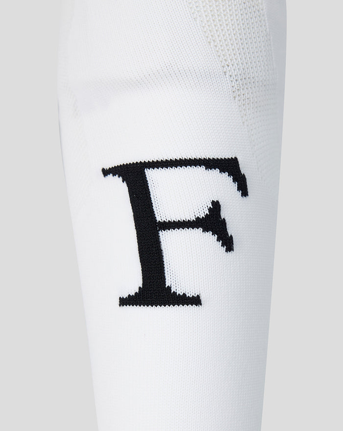Close-up of a white Feyenoord Thuis Wissel sock for adults showing a bold black F on the leg