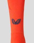 Orange Feyenoord third alternate sock for adults with a navy F on the shin and Castore branding on the calf