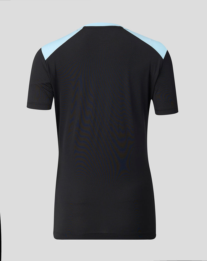 Back view of the black Feyenoord training coaches T shirt for women with light blue shoulder panels