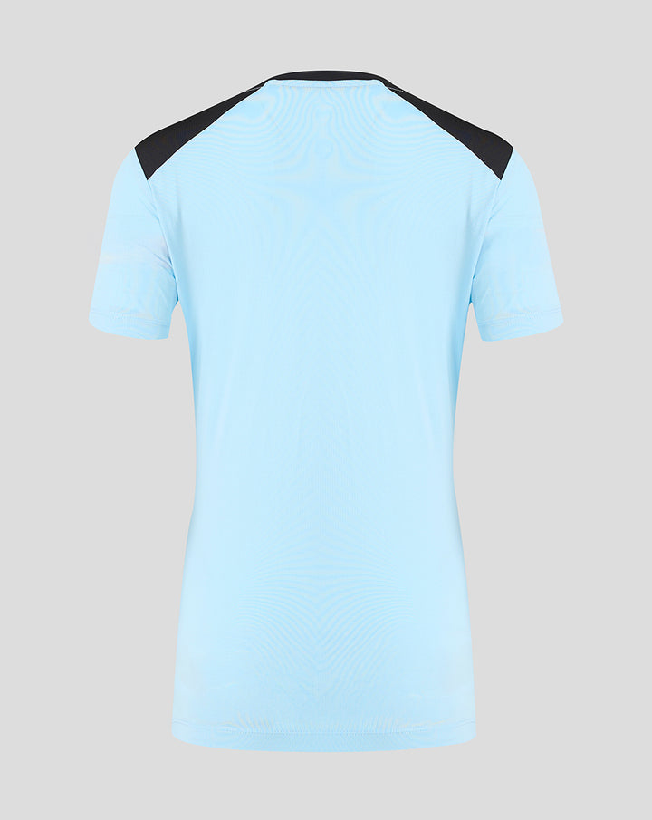Back view of light blue Feyenoord training shirt with black shoulder panels.