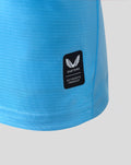 Close-up of blue textured Feyenoord Pro away shirt fabric with Castore badge