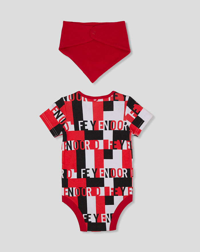 Red bib and back view of Feyenoord baby onesie with bold red black white checker pattern and crest emblem.