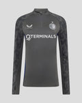 Feyenoord coaches midlayer top in dark gray with patterned sleeves, quarter zip, and Castore and Feyenoord logos on the chest
