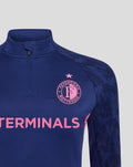 Close up of navy Feyenoord women training midlayer top with pink club crest and Castore logo on the chest