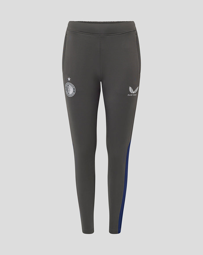 Donkergrijze Feyenoord trainingsbroek met zakken en blauwe zijkanten, Castore en Feyenoord logo op de benen.