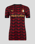Feyenoord women's home matchday T-shirt 2025–2026 with red and black circular pattern, gold Castore and MediaMarkt logos, and the club crest.