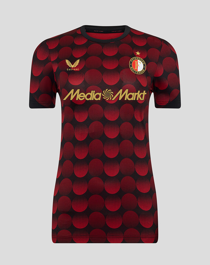 Feyenoord women's home matchday T-shirt 2025–2026 with red and black circular pattern, gold Castore and MediaMarkt logos, and the club crest.