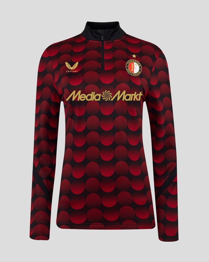 Front view of women's Feyenoord Matchday Midlayer Top with red circular pattern and gold Castore and MediaMarkt logos plus club crest on the chest.
