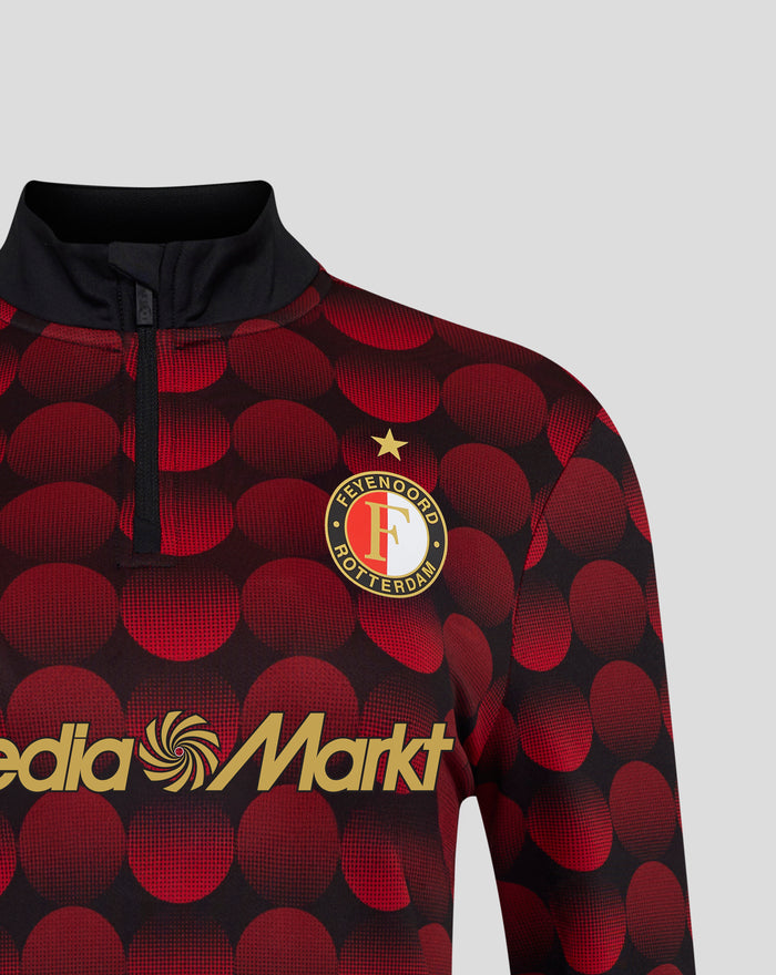 Feyenoord home matchday midlayer top with bold red circle pattern, zipper and crest with MediaMarkt branding.