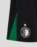 Lower front of black Feyenoord Pro away shorts for women with a green stripe a white star and club crest