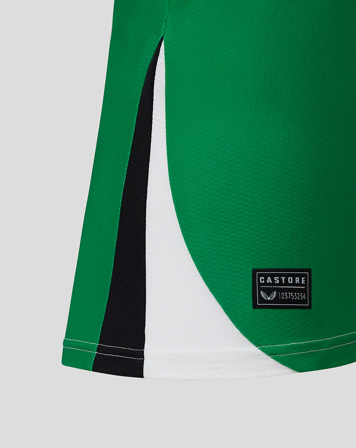 Close up of the Feyenoord Pro Third Shirt for women showing green fabric with white and black side panel and a Castore label.