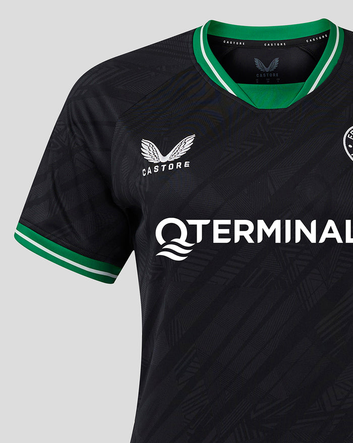Detail of the Feyenoord away jersey with crest on the left chest and bold QTERMINALS across the front plus green trim.
