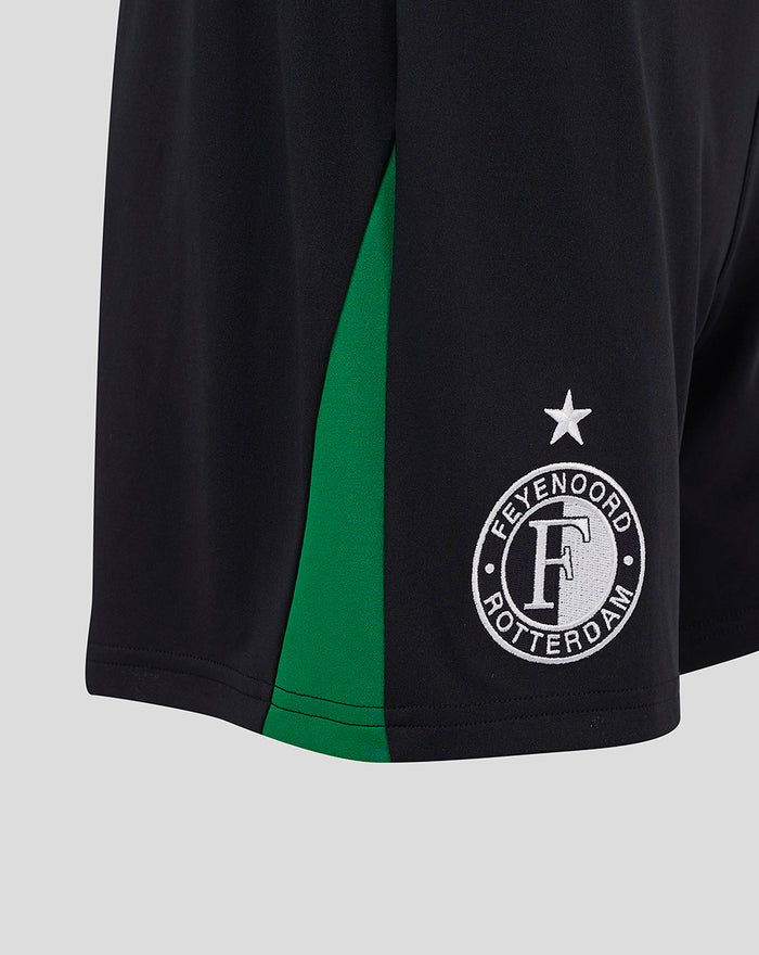 Close up of Feyenoord women's shorts showing black fabric green side panel and the club badge on the left leg