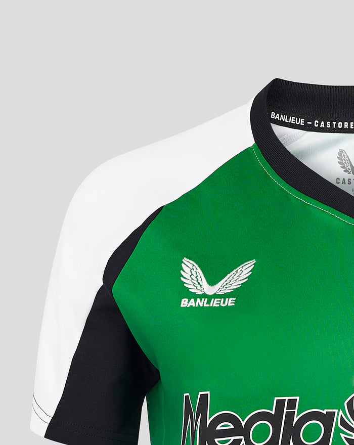 Close-up of the women's Feyenoord third shirt showing the green chest panel with Banlieue logo and Castore collar branding.