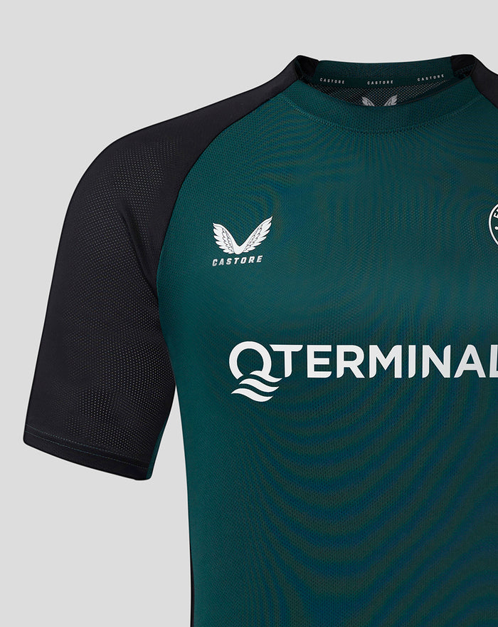 Close-up of chest area on teal Feyenoord Pro Coach Training T-shirt for women showing the club crest on the left and sponsor logo across the front