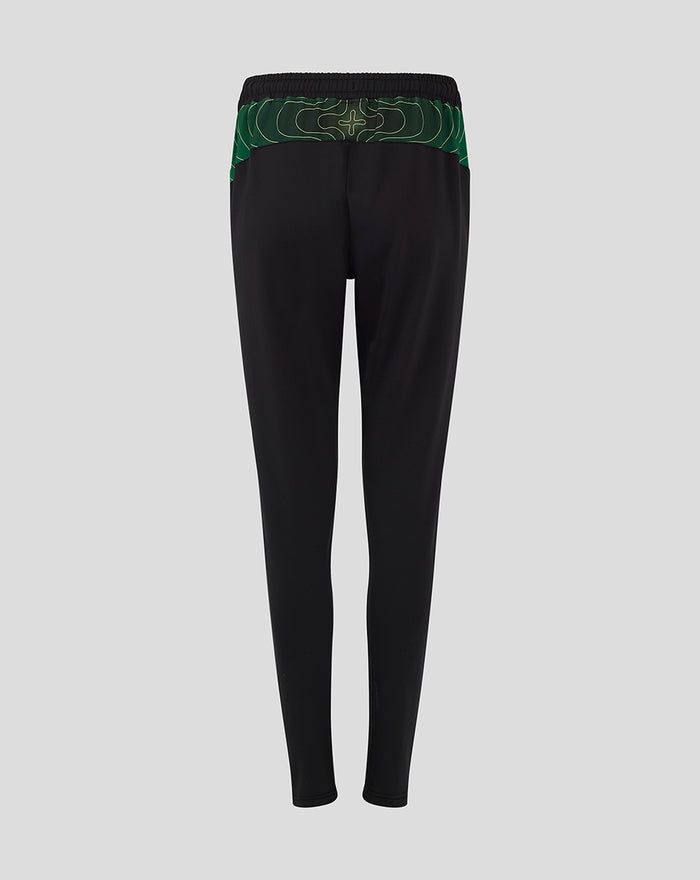 Back view of black women's matchday shorts with a green patterned waistband