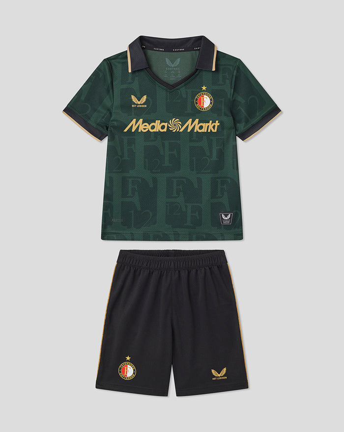 Front view of the Het Twaalfde shirt kids kit 2025 2026 with green jersey featuring the Media Markt sponsor and black shorts with gold trim