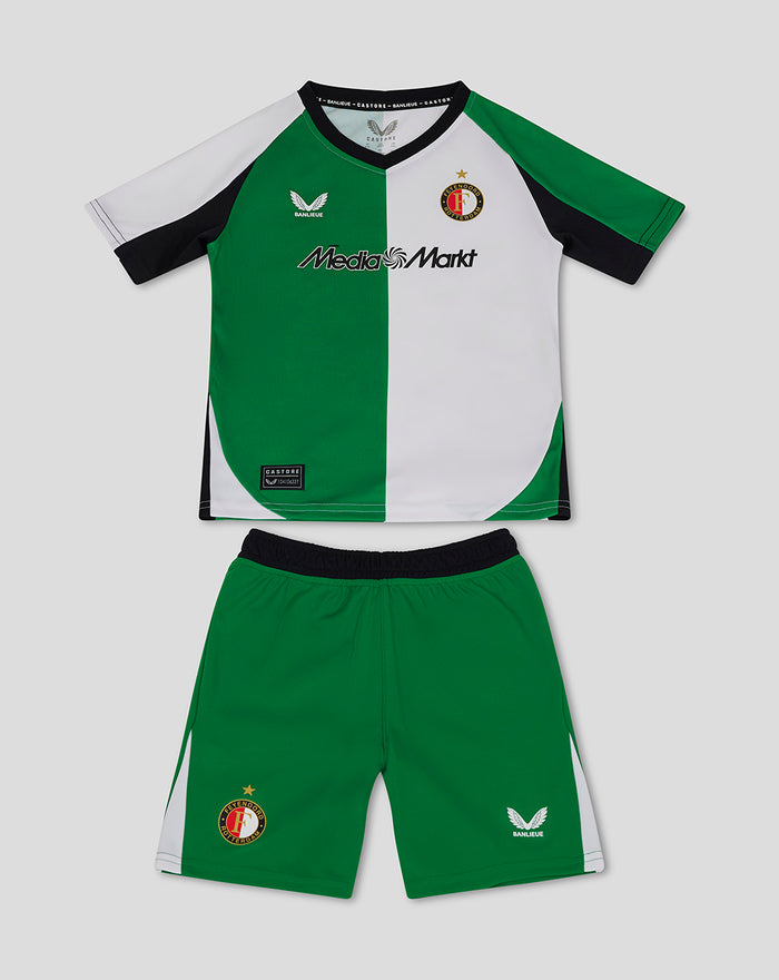 Kids Feyenoord third kit with a green and white split shirt and matching shorts bearing Feyenoord and Castore branding.