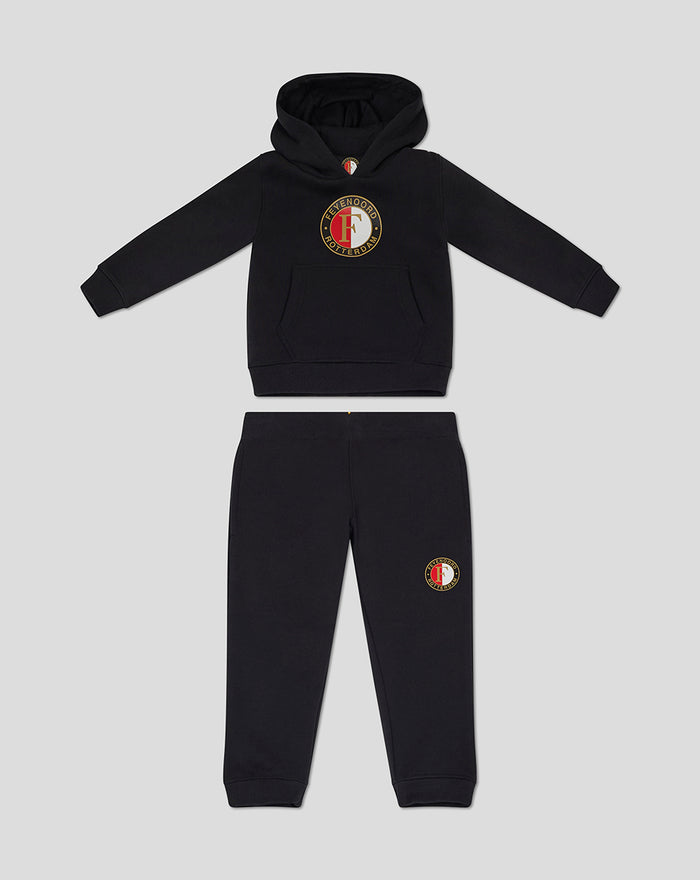 Front view of black Feyenoord Core hoodie and joggers for children with chest and leg logos