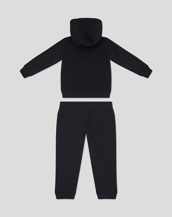 Back view of black Feyenoord Core hoodie and joggers for children with circular emblem on the left leg