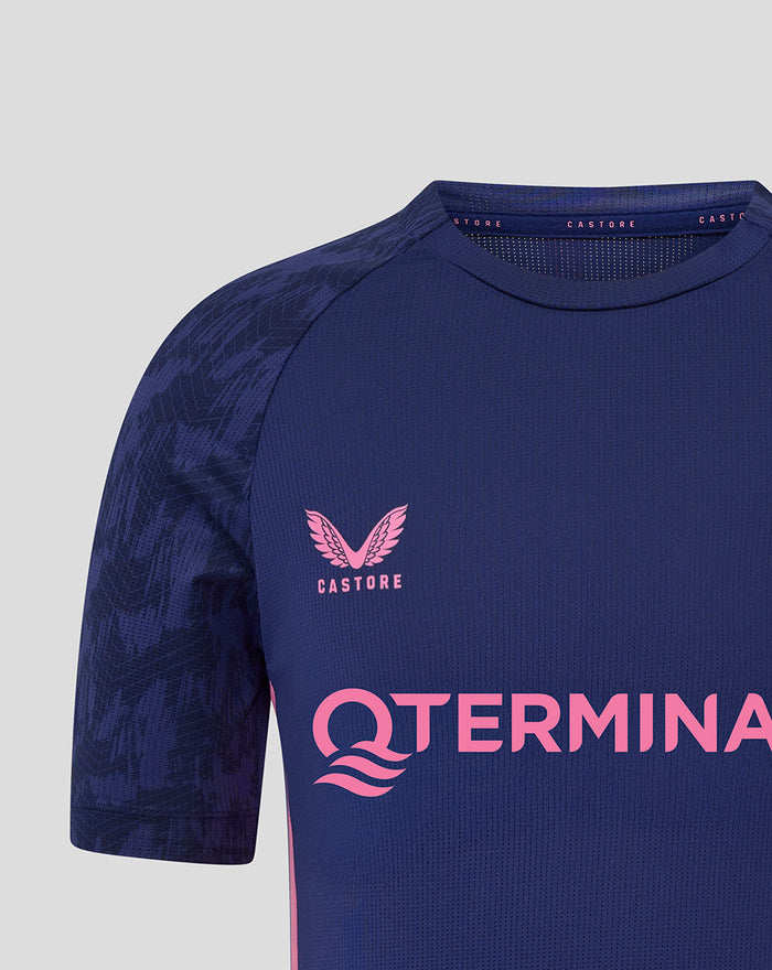 Close-up of navy Feyenoord training T shirt with pink Castore logo on the right chest and pink sponsor text across the front