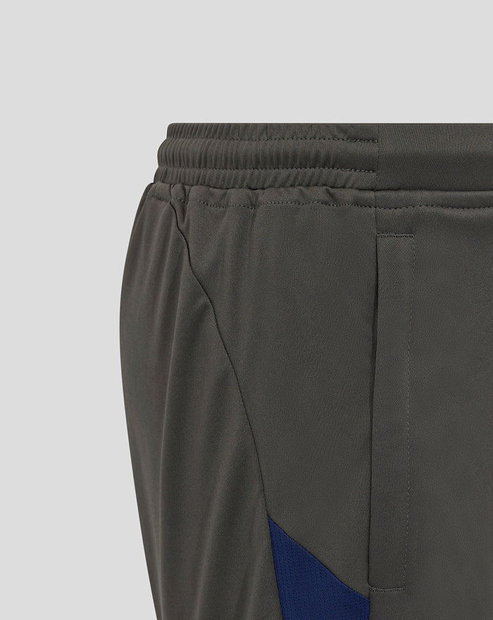 Close-up of Feyenoord Coaches Training Short showing elastic waistband with blue contrast side panel and reinforced stitching.