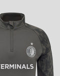 Close up of the dark gray Feyenoord Coaches Training Midlayer Top showing left chest Feyenoord crest with star above.
