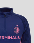 Navy blue Feyenoord training midlayer top close up with funnel neck, left chest pink club crest, and bold pink lettering across the front.