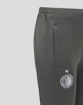 Close up of the leg showing the Feyenoord crest with a star above on dark grey fabric and a blue side panel