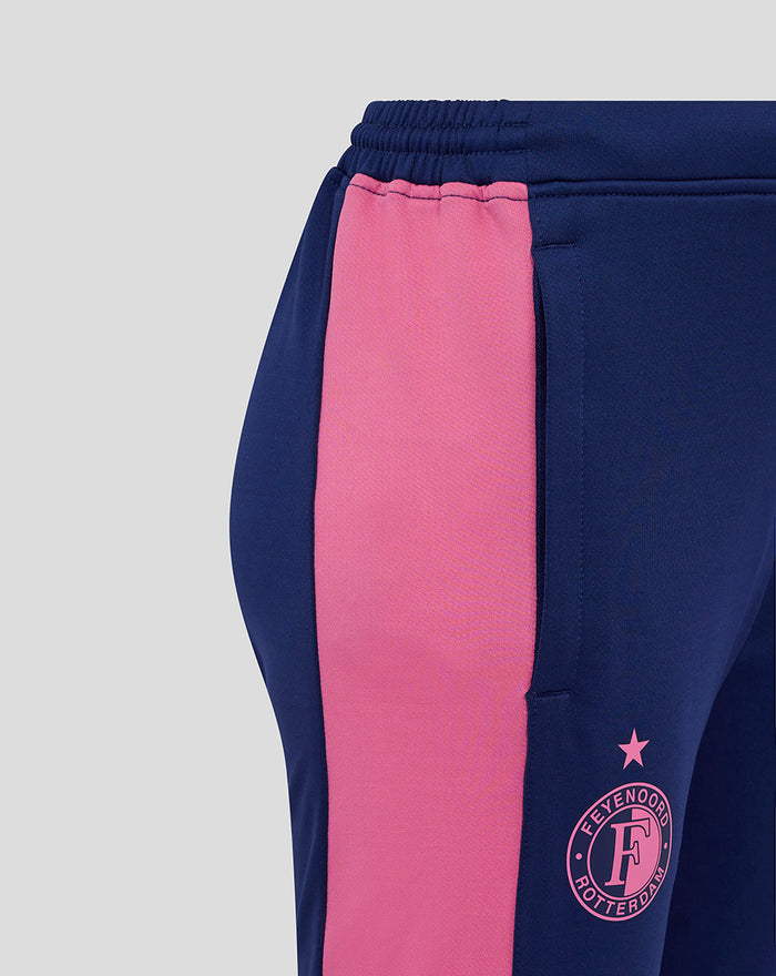 Close up of navy Feyenoord training pants with a pink side stripe and Feyenoord crest on the leg