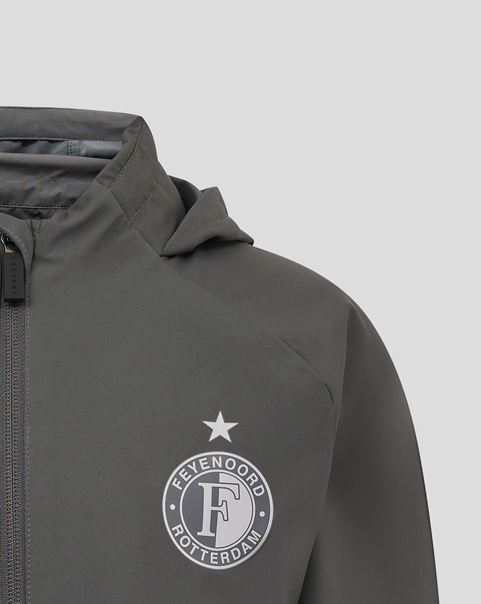 Close up of a grey Feyenoord training jacket chest area featuring the circular club crest and a white star above
