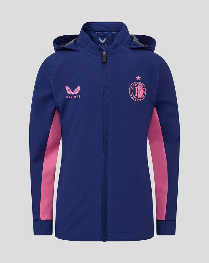 Front view of a blue junior Feyenoord training rain jacket with pink side panels and crest.