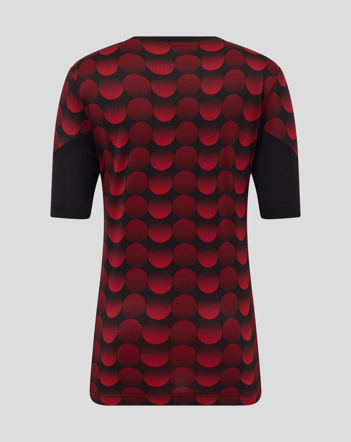 Back view of Feyenoord home matchday junior jersey with a bold red dot pattern on black fabric