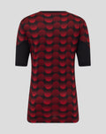Back view of Feyenoord home matchday junior jersey with a bold red dot pattern on black fabric