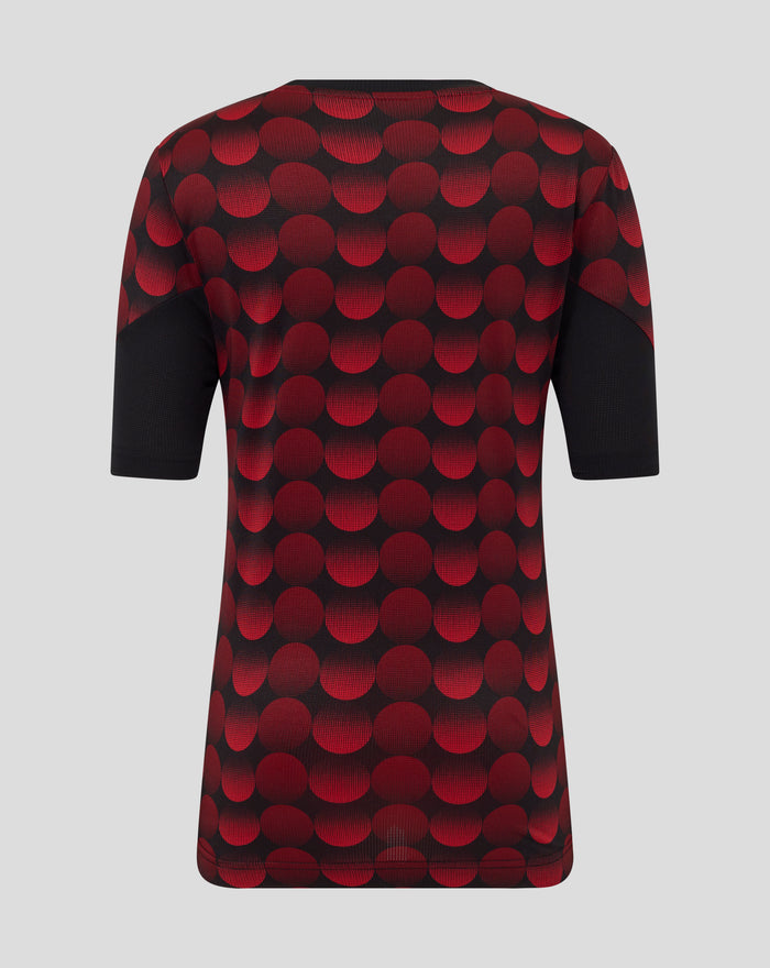 Back view of Feyenoord home matchday junior jersey with a bold red dot pattern on black fabric