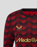 Front chest view of the Feyenoord jersey featuring the club crest and sponsor logos on the red polka dot pattern