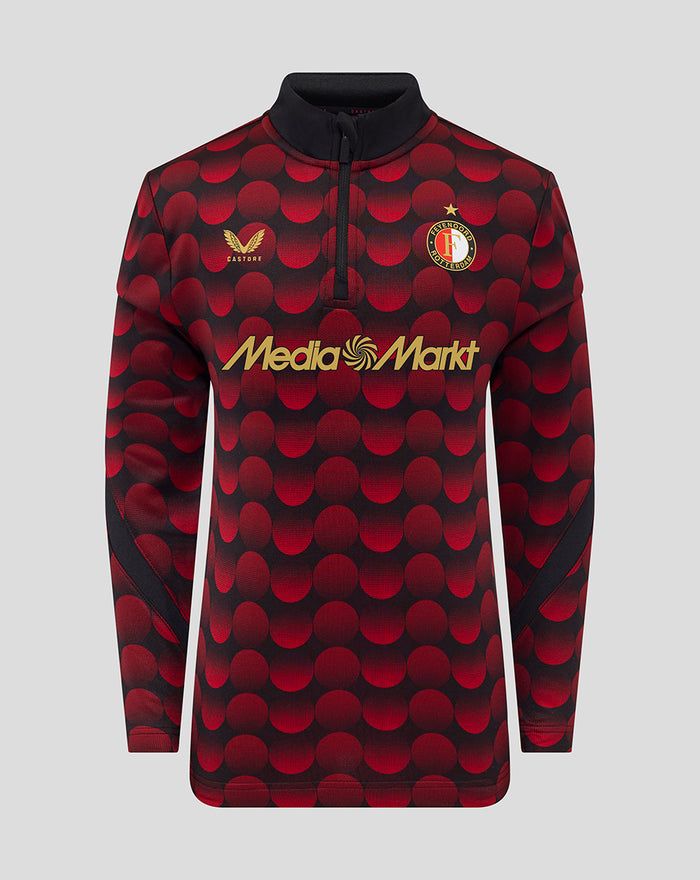 Feyenoord home matchday midlayer top for juniors in red and black with circular dot pattern and gold MediaMarkt sponsor logo