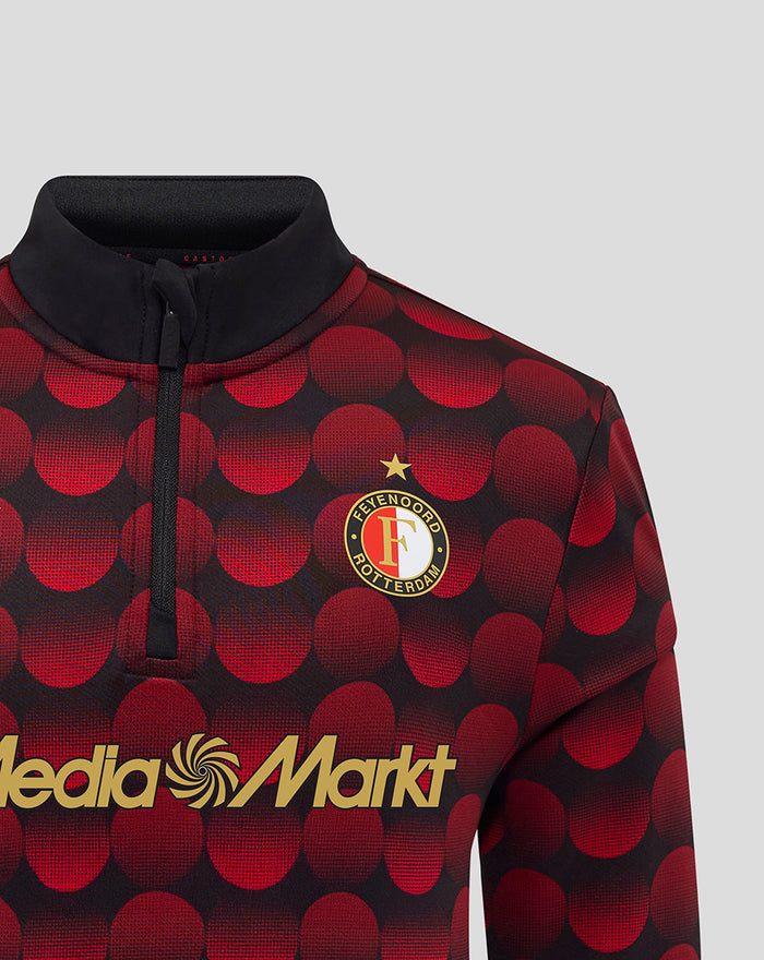 Feyenoord home matchday midlayer top in red dotted pattern with club crest and MediaMarkt logo.